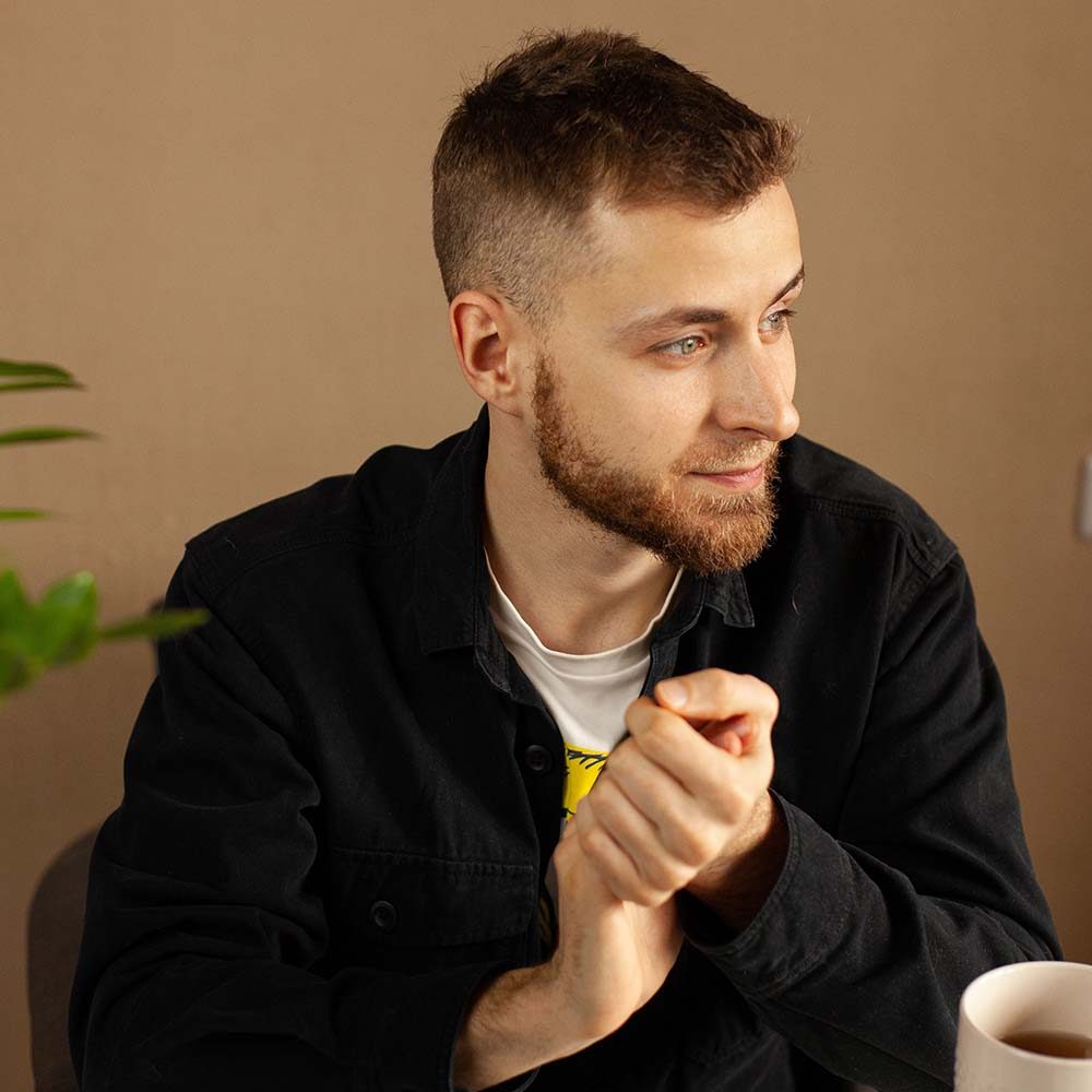 portrait-of-a-man-at-the-table-YJX95FB.jpg